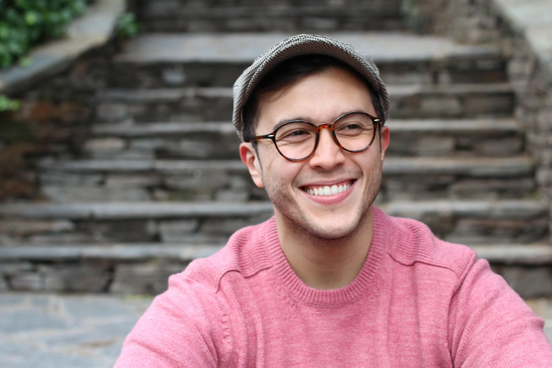 smiling man with glasses who got a dental crown in Logan UT