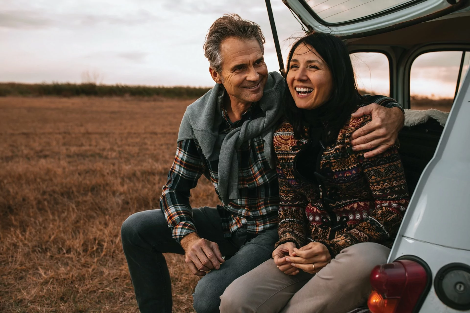 smiling couple who no longer have tooth pain