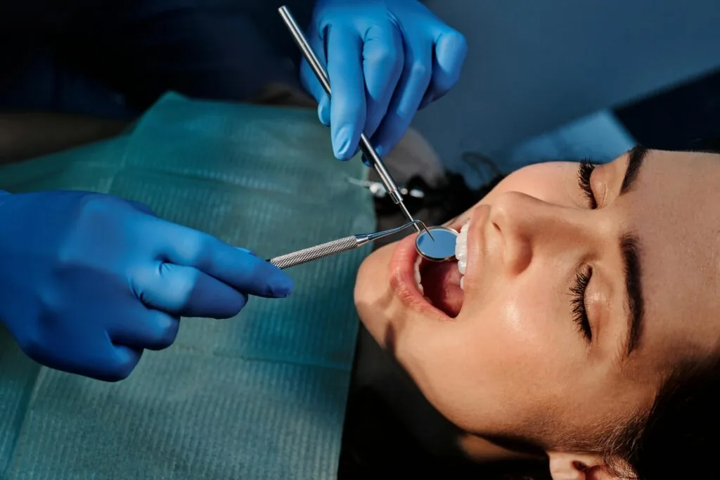 Logan, UT woman receiving oral cancer screening in Cache Valley
