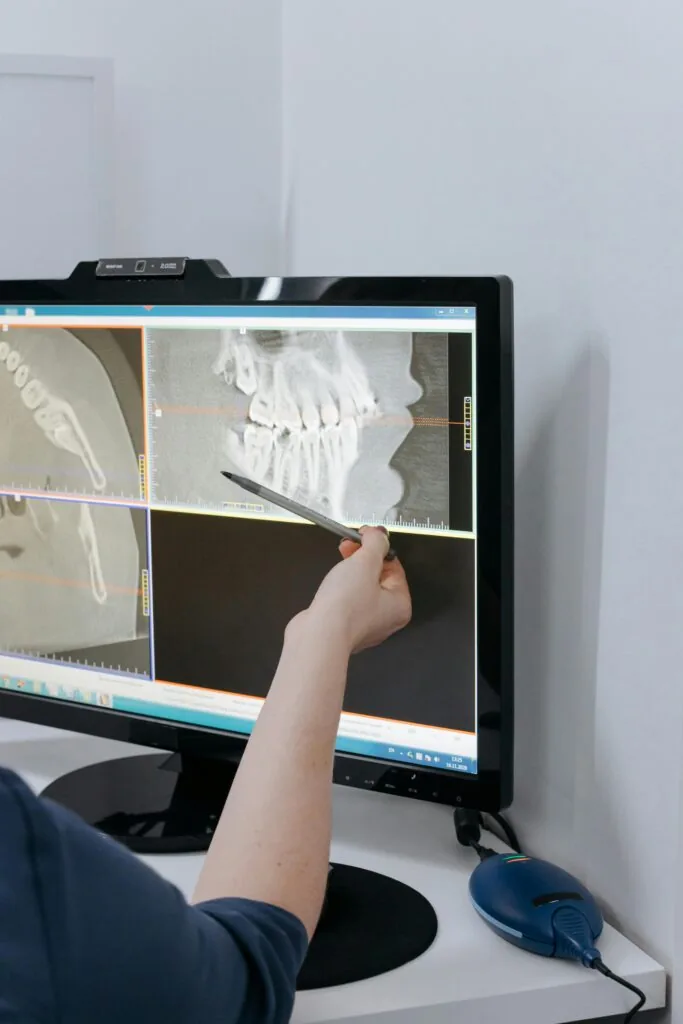 Logan, UT dentist reviewing imaging for TMJ treatment